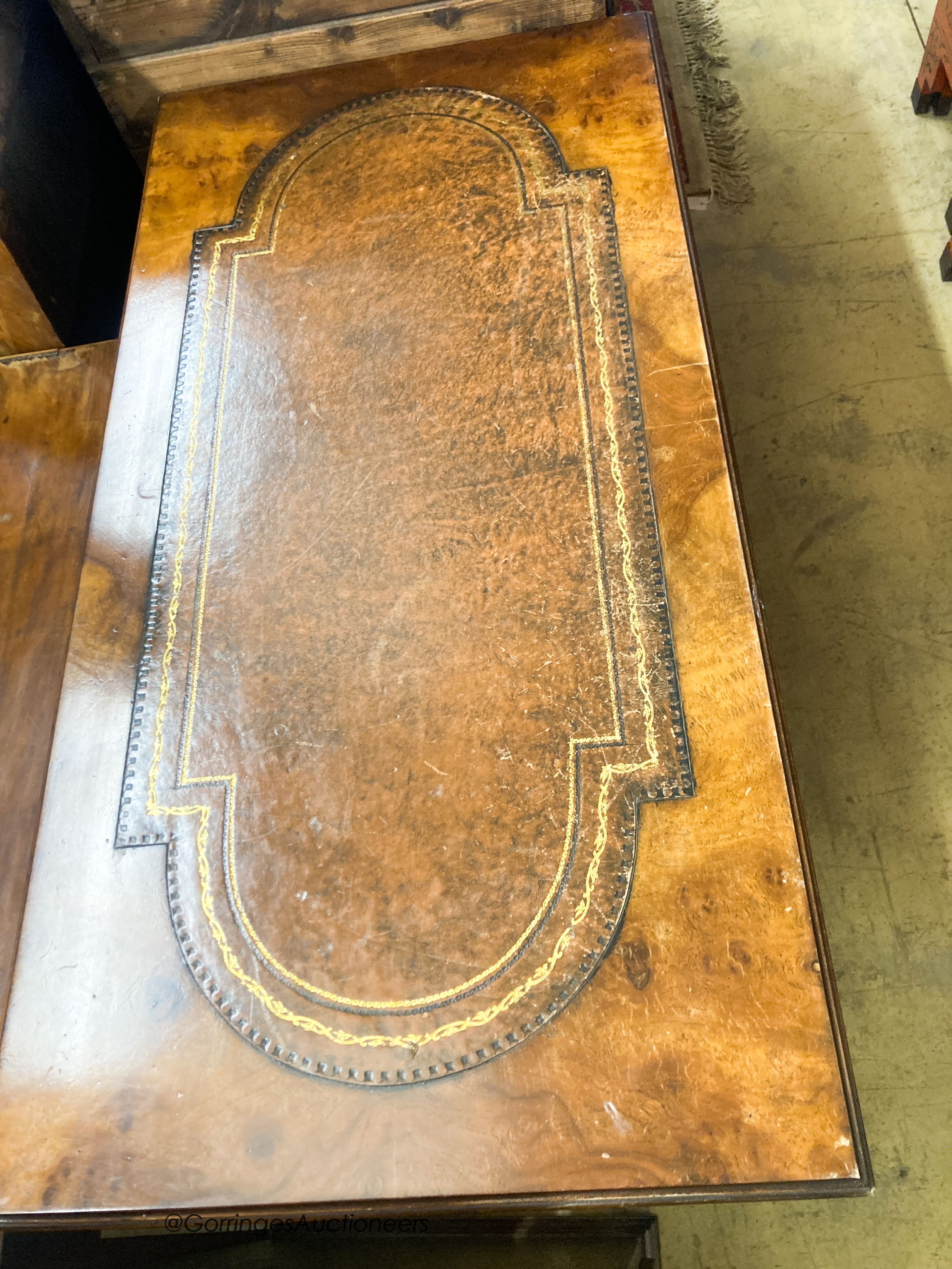 A George III style walnut two drawer writing table, W.122cm D.60cm H.80cm